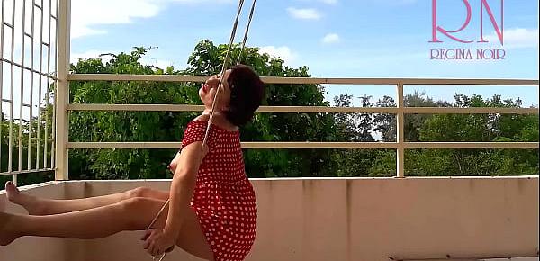  Cute housewife has fun without panties on the swing. Slut swings and shows her perfect pussy.